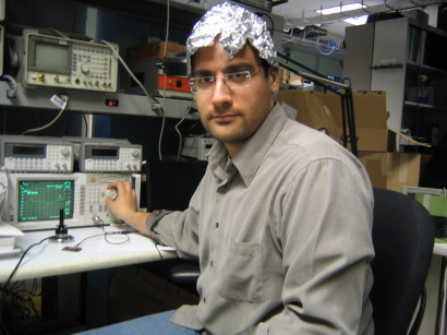 a scientist in a tinfoil hat